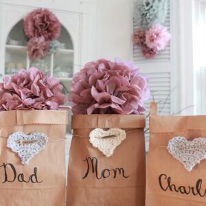 Valentine love sacks assembled with paper flowers feature