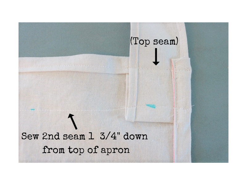 Cross back linen apron - step 5 - 2nd seam to attach straps to apron - label