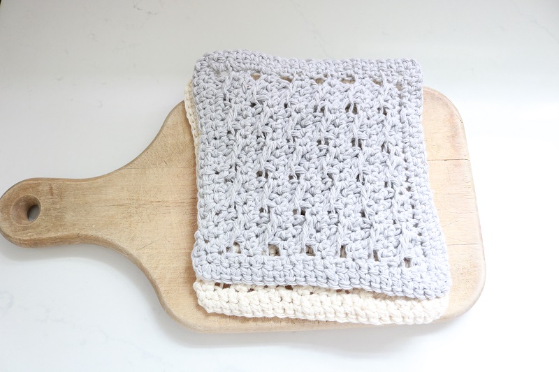 Farmhouse Crochet Dish Cloths - on wood cutting board