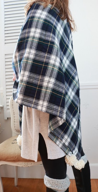 DIY Plaid Shawl - make this no-sew plaid blanket scarf with navy plaid fabric and pom poms. Wear it or toss it as a throw blanket! #fallshawl #plaidthrow #plaidshawl #blanketscarf