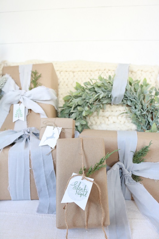 Make your own muslin ribbons by dyeing strips of muslin fabric.  Dye the ribbons any color you'd like using Rit fabric dye.  They're perfect for a rustic farmhouse style!  #christmasribbon #weddingribbon #handdyeribbon