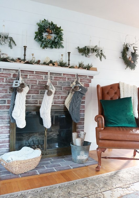 Take a little tour of our farmhouse Christmas styled living room.  We love enjoying a fire in the fireplace, smelling the Christmas tree, and listening to music.  #farmhousechristmas