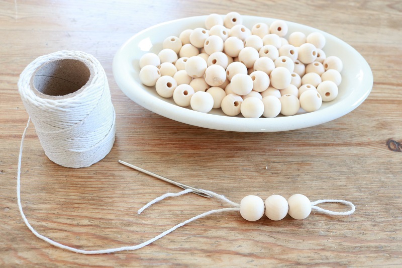 Upcycle Mason Jar to Hygge - thread beads back through twine