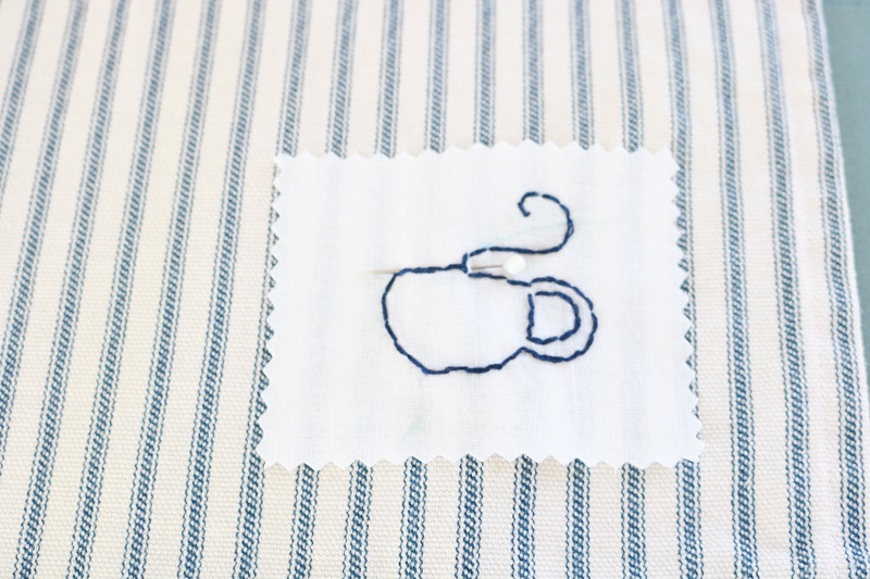 Farmhouse Style Tea Towel - white patch pinned to tea towel