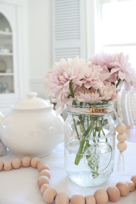 Scandinavian Inspired Easter Table - table setting, closeup of flowers and teapot