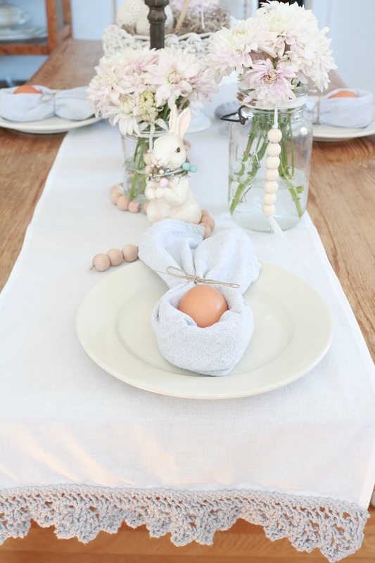 Scandinavian Inspired Easter Table - table setting, egg, runner, bunny and flowers