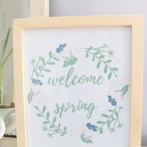 Welcome Spring Printable - on bookshelf, closeup