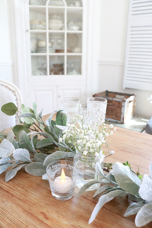 Spring Brunch Table Setting - view of babys breath flowers and greenery
