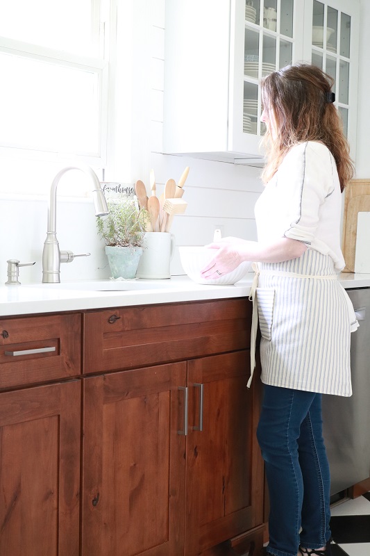 Farmhouse Style Pocket Apron - wearing in kitchen, at sink
