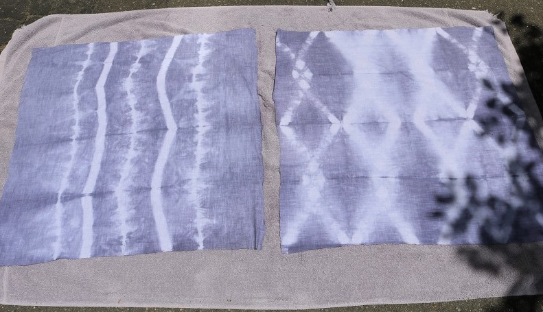 Shibori Tie Dye Pillows - finished dyed fabric, drying outside