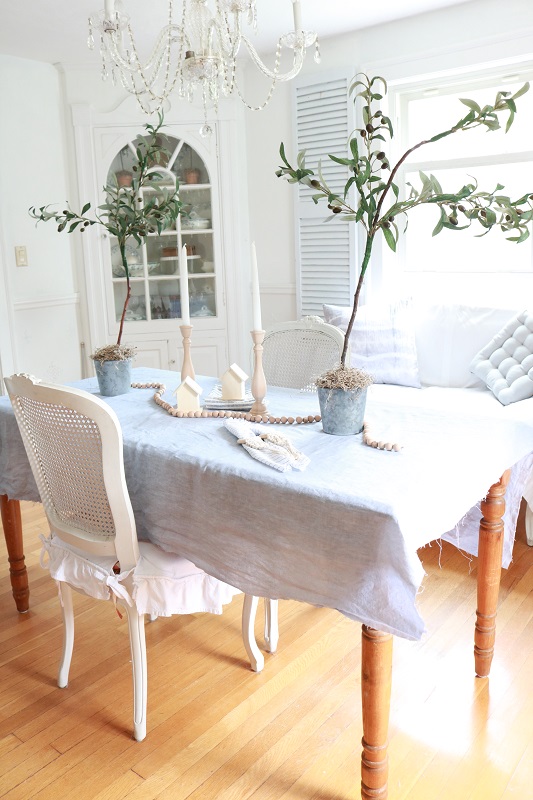 DIY Faux Olive Topiary - finished topiaries on table, afar