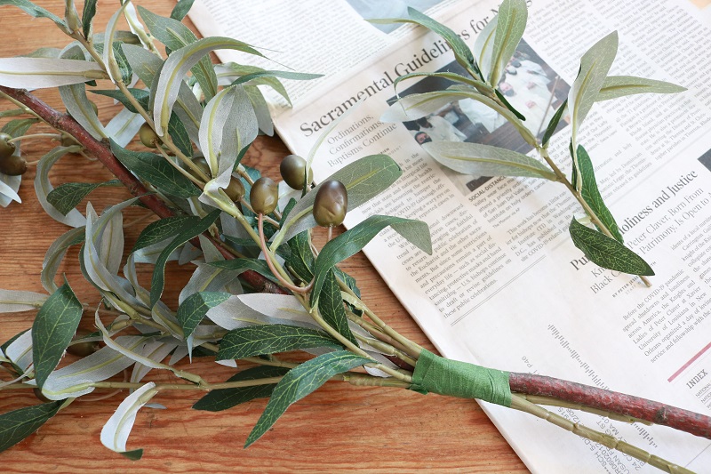 DIY Faux Olive Topiary - stems attached to branch with floral tape, small stem removed