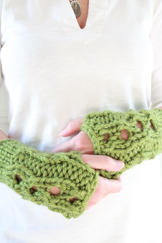 Chunky Knit Hand Warmers - wearing finished pair of hand warmers, showing thumb holes 2