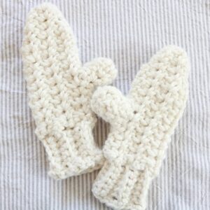 Chunky Mittens Crochet - finished, on ticking fabric