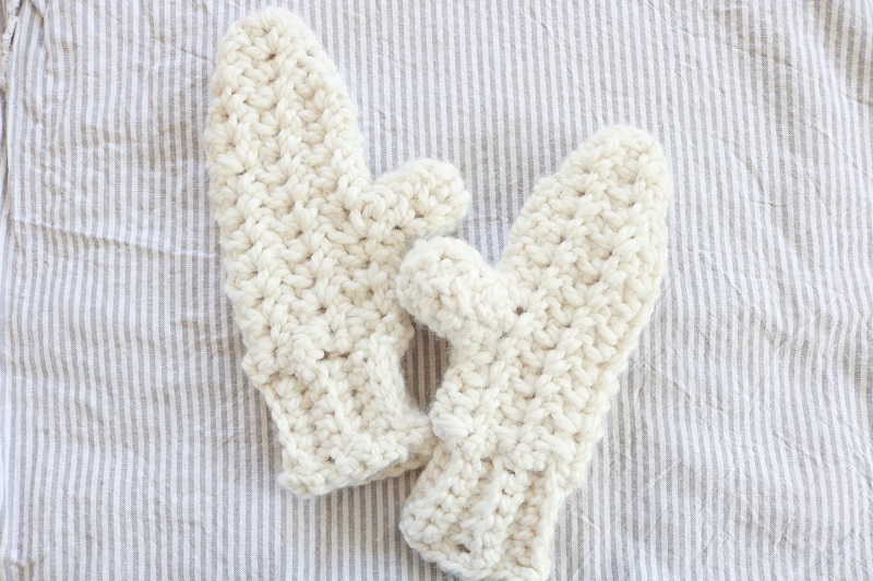 Chunky Mittens Crochet - finished, on ticking fabric