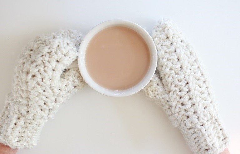 Chunky Mittens Crochet - finished, wearing holding teacup