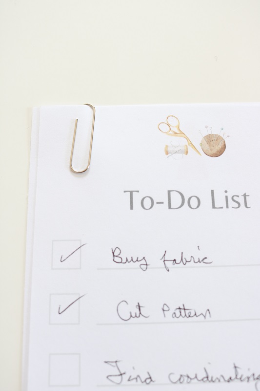 Free Sewing Printable to do list - page with written list and paper clip