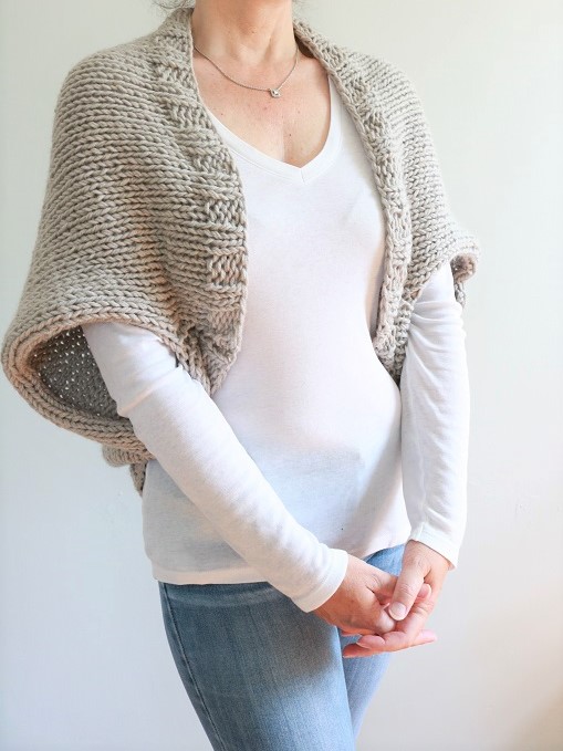 Knit Cable Shrug - wearing, turned view