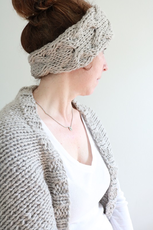 Knit Cable Shrug - wearing with ear warmer, turned view, closeup