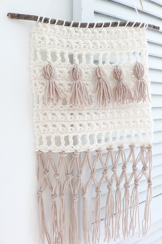 Fringe Crochet Wall Hanging - finished wall hanging on shutter, closeup