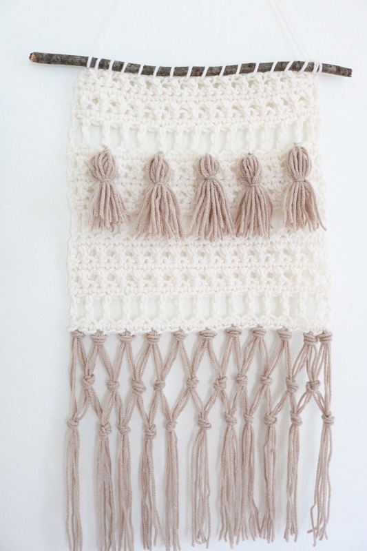 Fringe Crochet Wall Hanging - finished wall hanging on wall