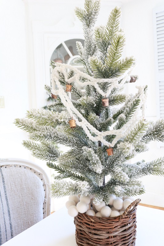 Christmas Yarn Crafts - brass bell garland - finished garland on tree