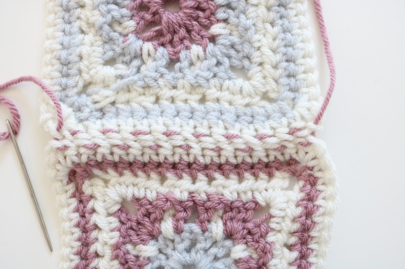 How to Join Granny Squares - finished, showing wrong side, contrasting color
