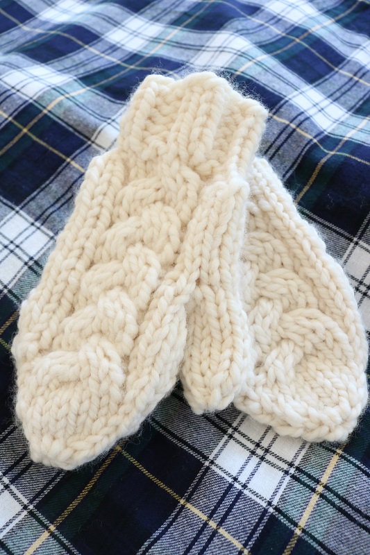 Knit Cable Mittens -finished mittens on plaid fabric