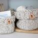 Barnstable Basket Knitting Pattern - finished baskets as storage on shelf