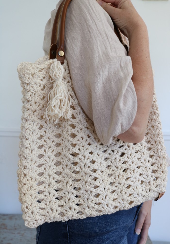 Magnolia Market Bag Crochet Pattern - holding bag over shoulder
