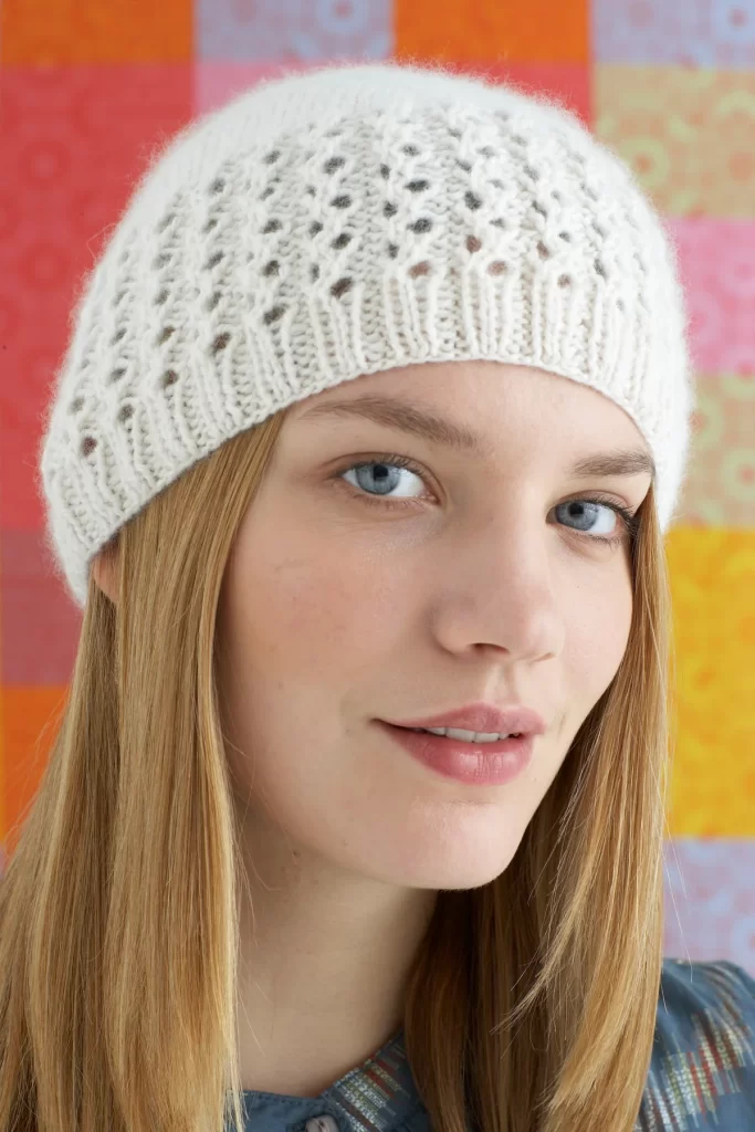 woman wearing lace knit cap