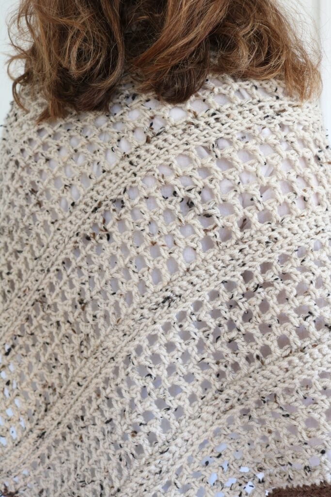 woman wearing fall crochet poncho