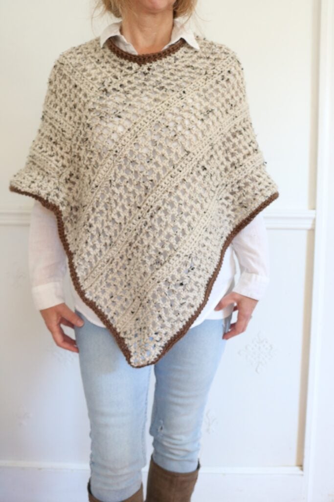 woman wearing fall crochet poncho