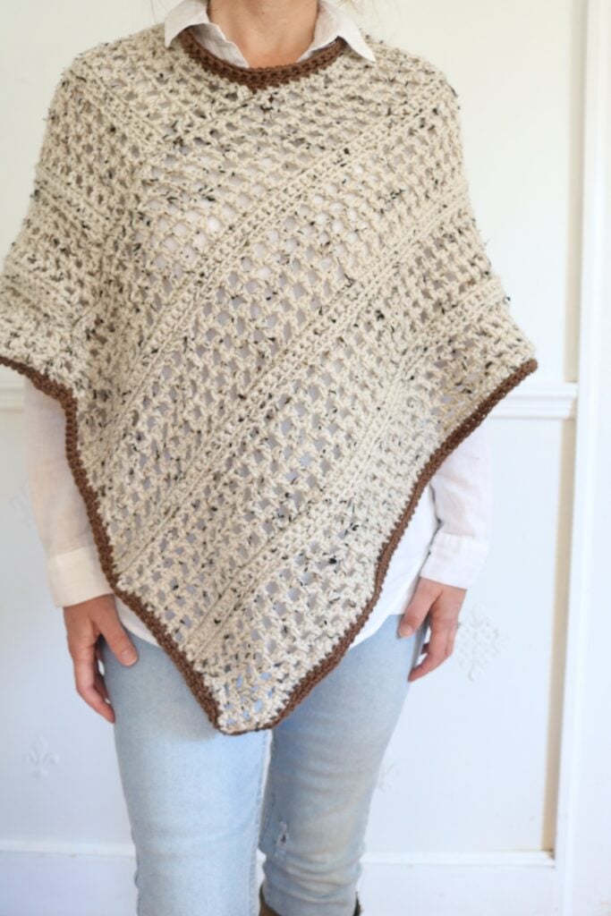 woman wearing fall crochet poncho