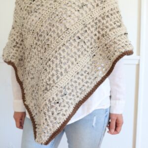 woman wearing crochet poncho