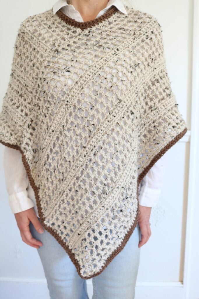 woman wearing fall crochet poncho
