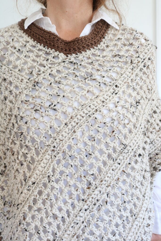 woman wearing fall crochet poncho