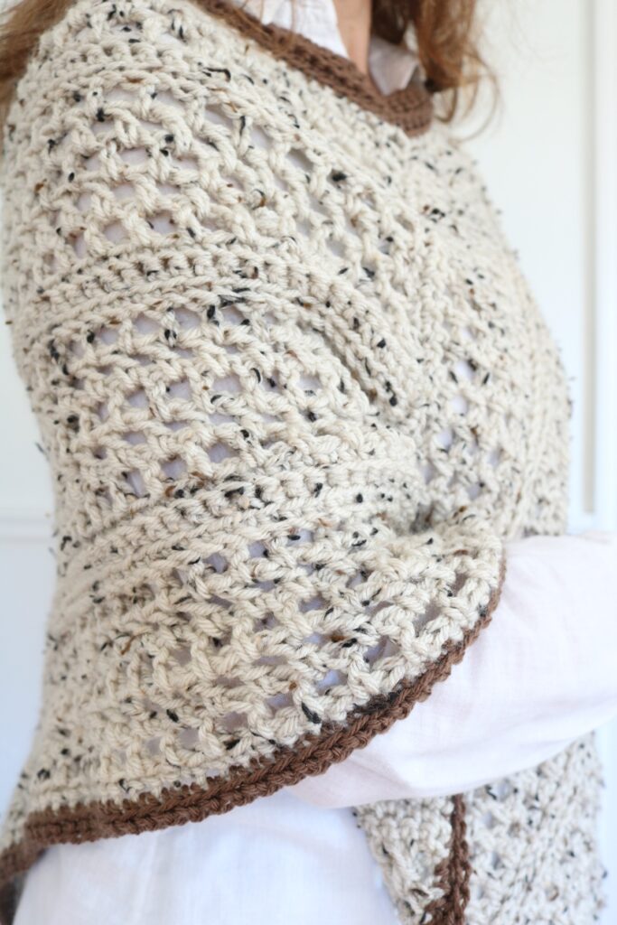 woman wearing fall crochet poncho