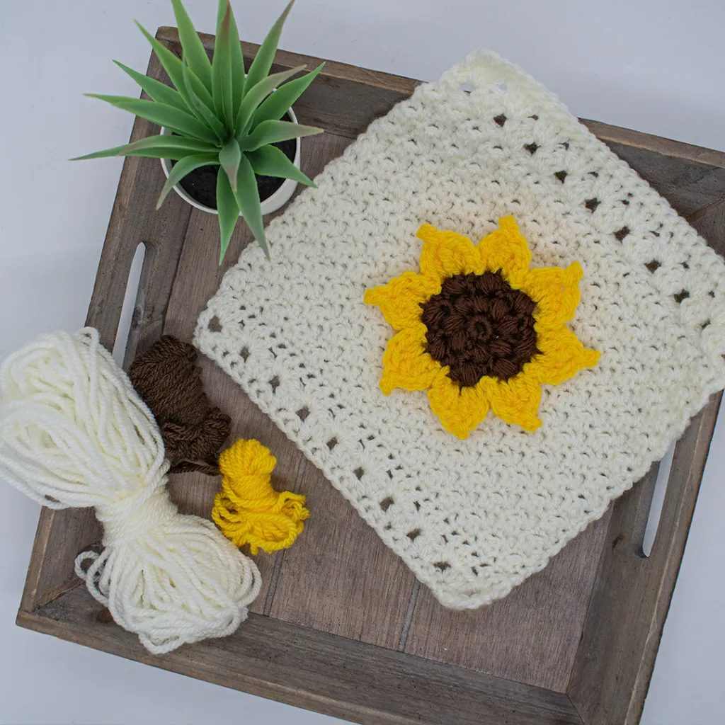 sunflower crochet square and yarn