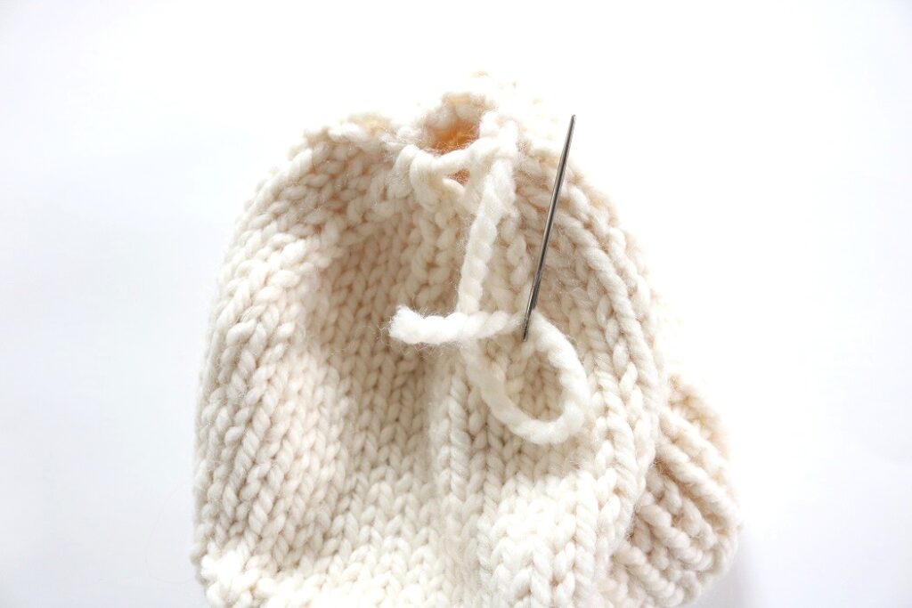 Knit Beginner Hat Pattern - after pulling tail through last 8 sts