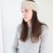 woman wearing crochet headband