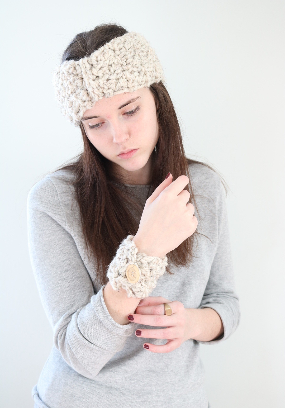 woman wearing crochet headband and bracelet cuff