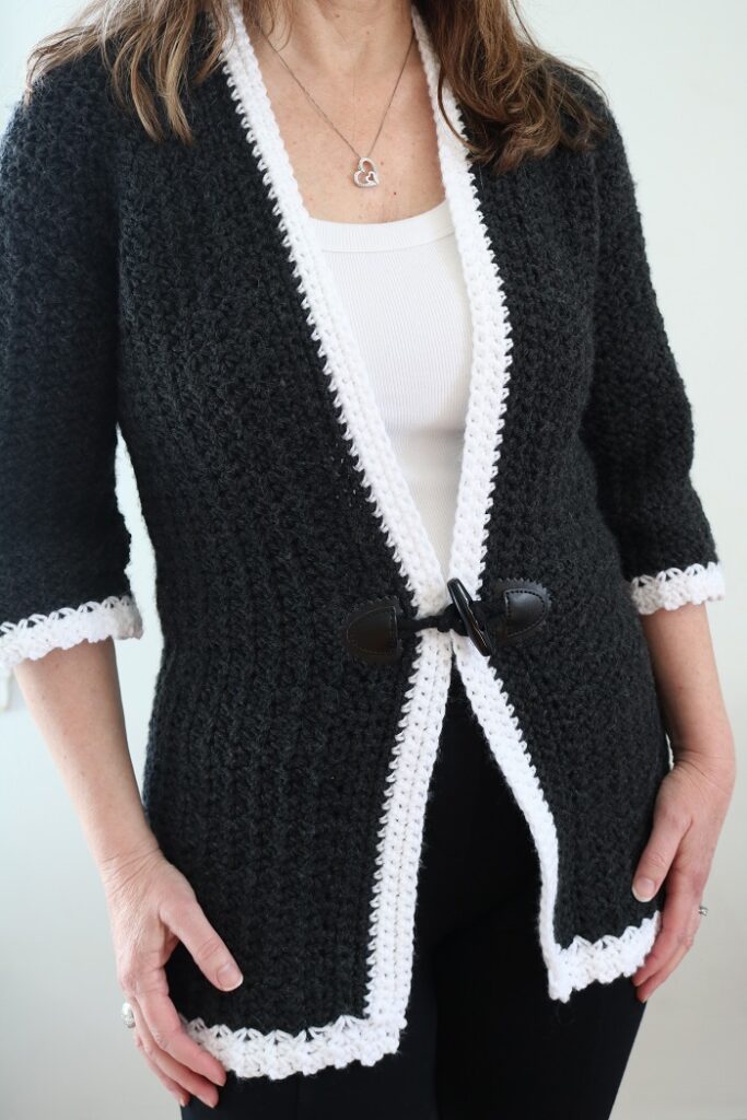 woman wearing vintage style crochet cardigan