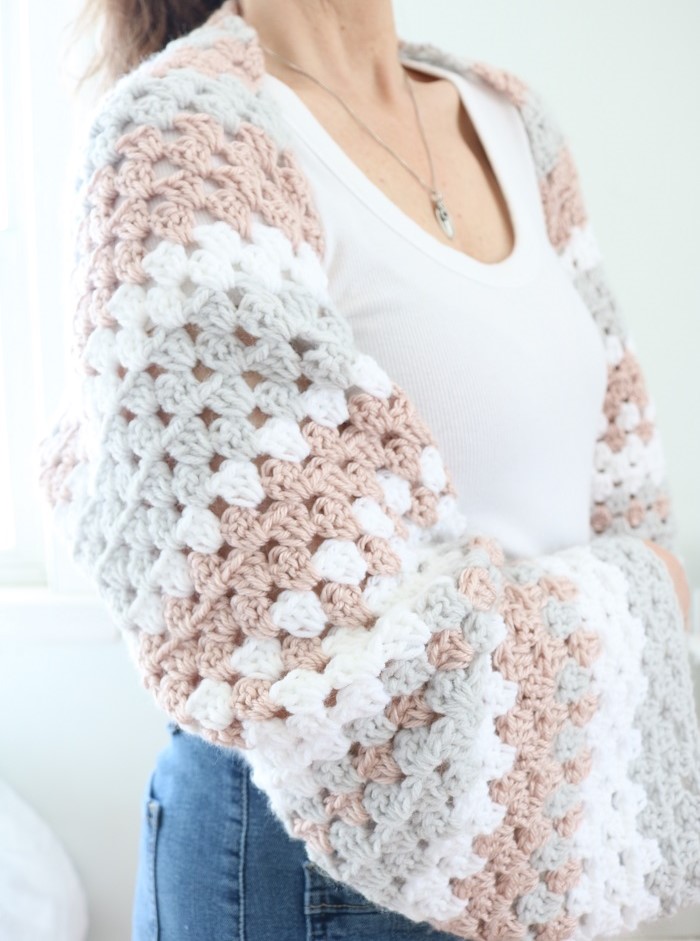 side view of woman wearing crochet shrug