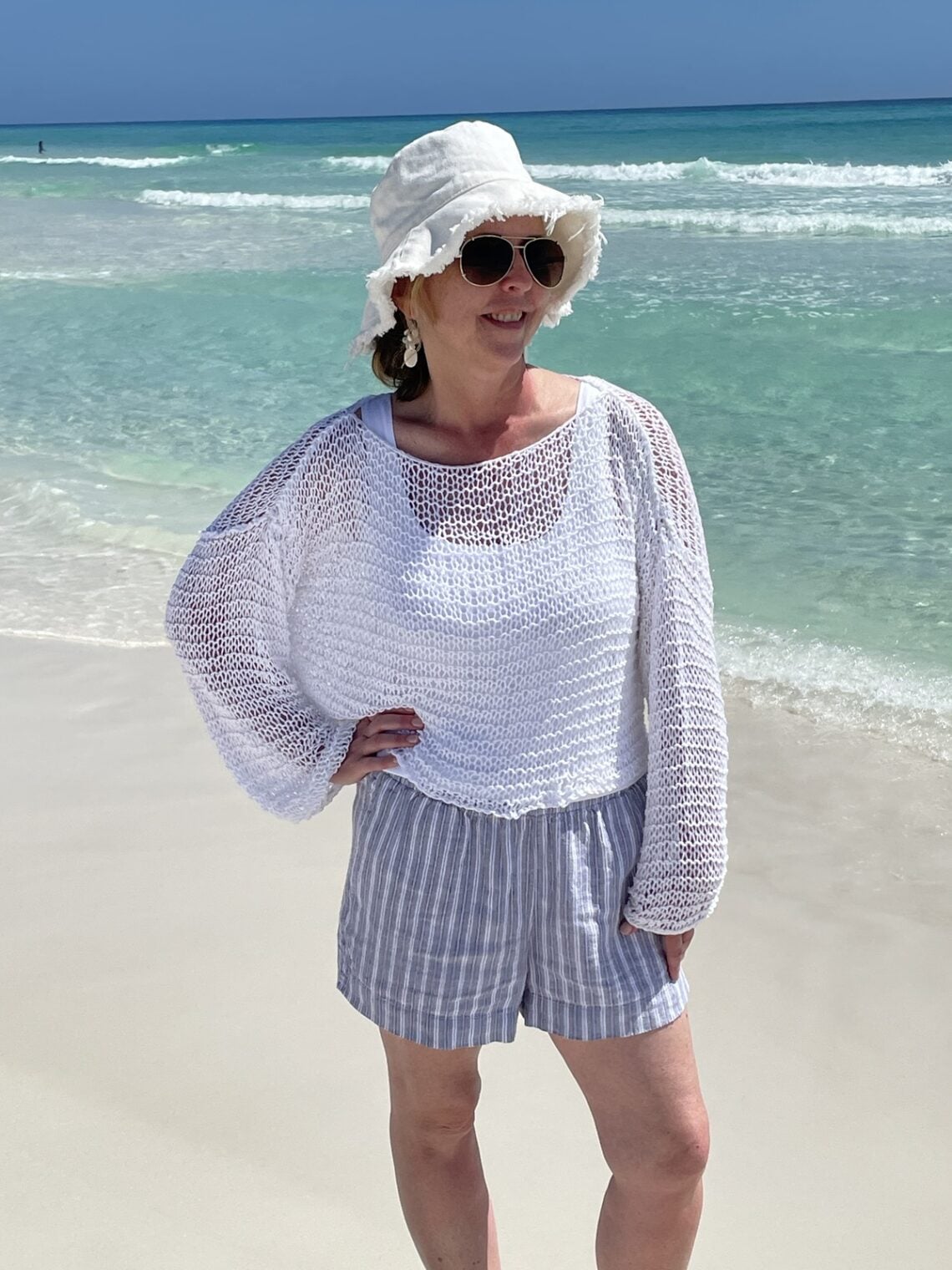 woman wearing summer knit sweater