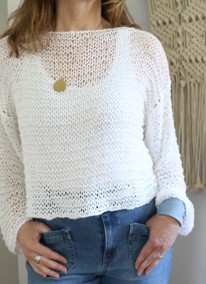 woman wearing lace knit summer sweater