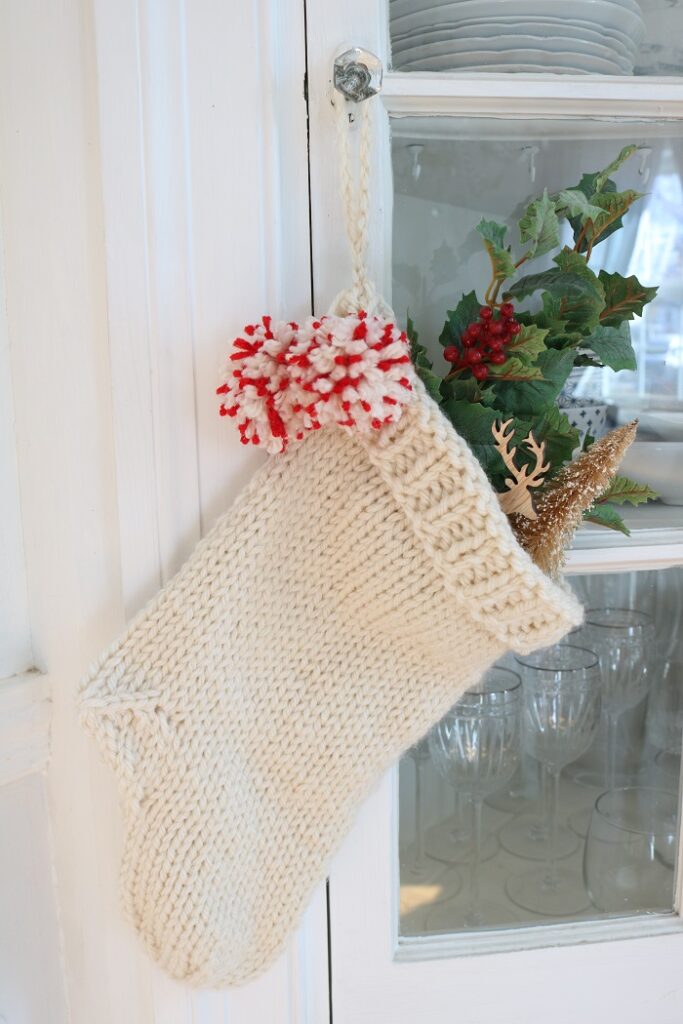 Christmas Stocking Knit Pattern - hanging on cabinet door