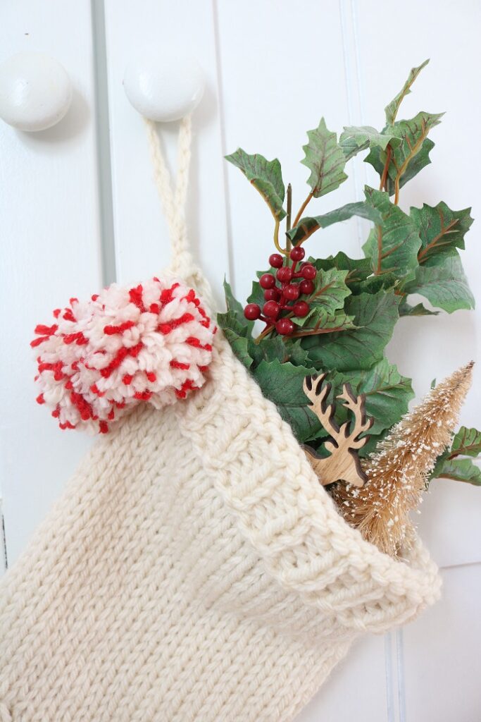 Christmas Stocking Knit Pattern - hanging on cupboard, closeup of top