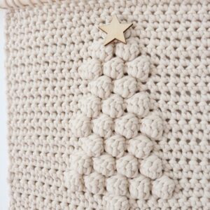 Winter Tree Wall Hanging Crochet Pattern - on wall, closeup, from right