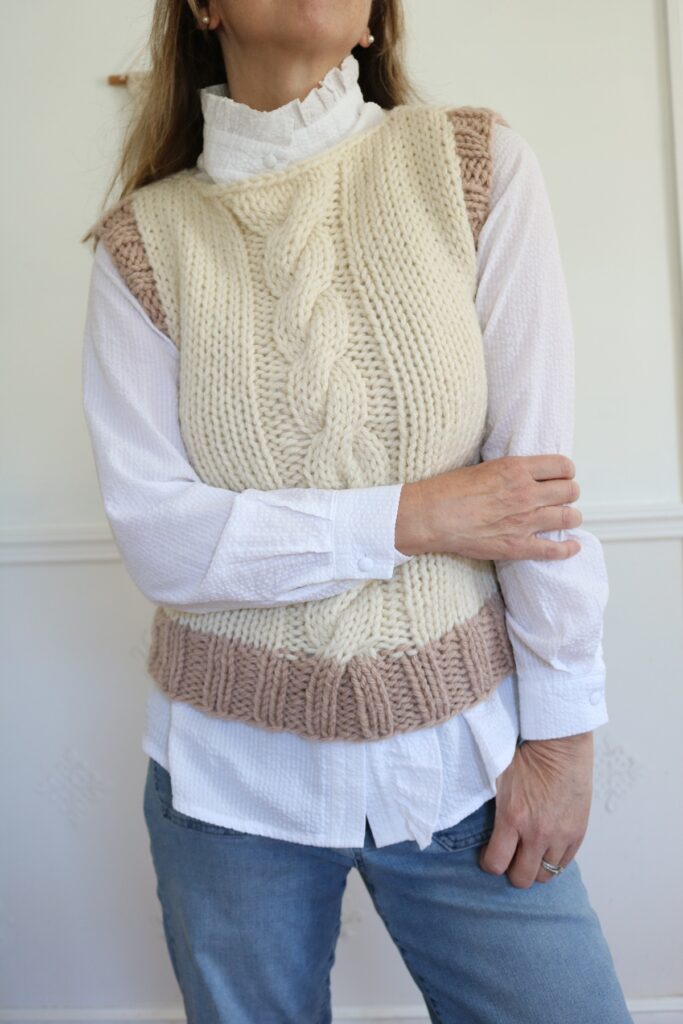 woman wearing cable knit vest